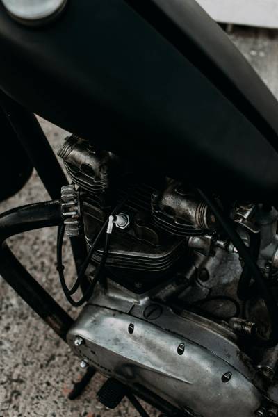 Où trouver un chargeur de batterie intelligent pour ma batterie moto proche de Honfleur ?